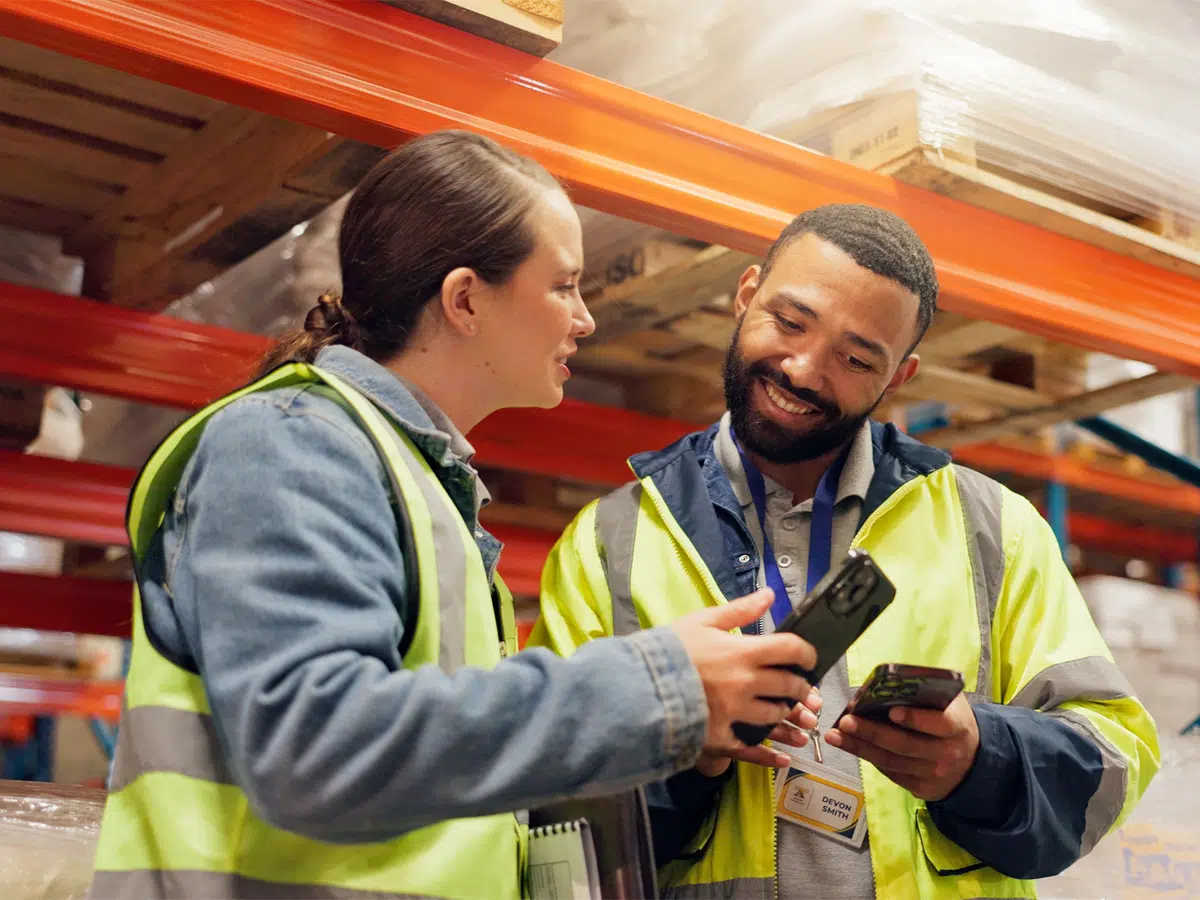 Warehouse team checking freight route details